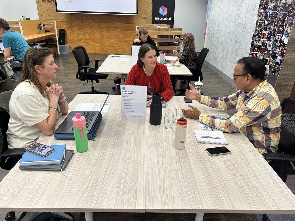 A small group at the Product Development and Prototyping station